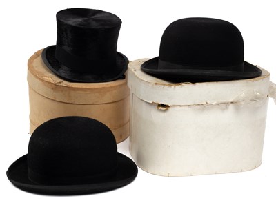 Lot 321 - A black silk top hat