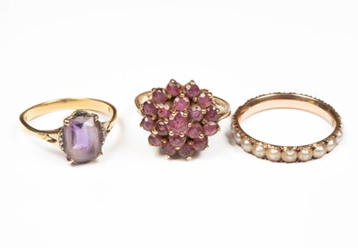 Lot 380 - An 18ct yellow gold and amethyst dress ring