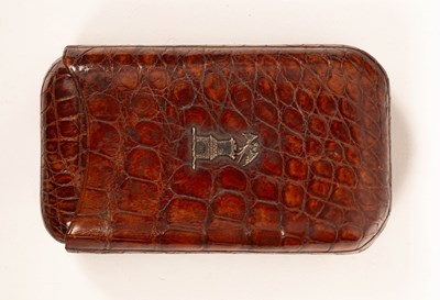 Lot 150 - A crocodile skin cigar case