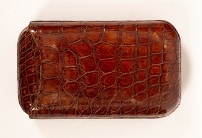 Lot 150 - A crocodile skin cigar case