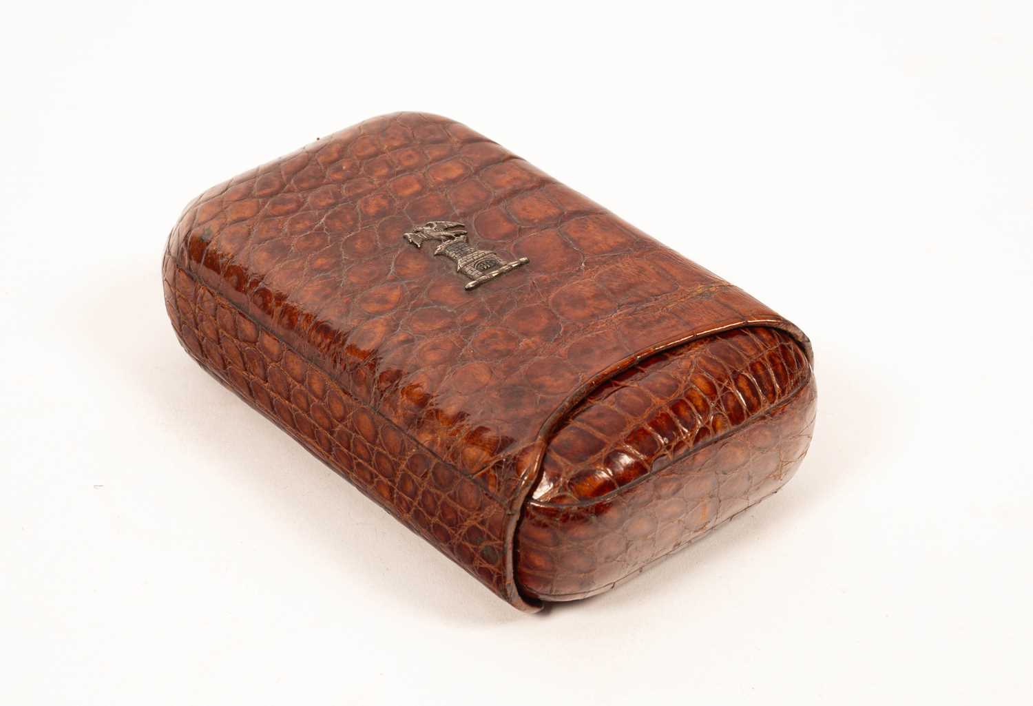 Lot 150 - A crocodile skin cigar case