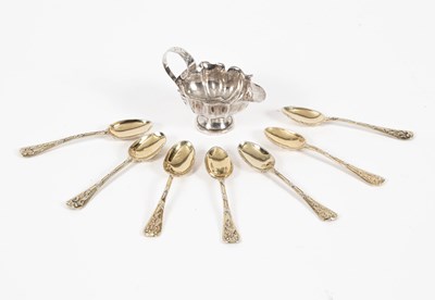 Lot 12 - A set of seven Continental gilt metal teaspoons