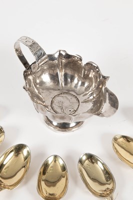 Lot 12 - A set of seven Continental gilt metal teaspoons