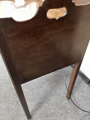 Lot 76 - A near pair of George III tray top pot cupboards