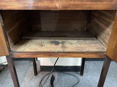 Lot 76 - A near pair of George III tray top pot cupboards