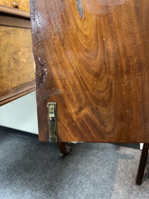 Lot 76 - A near pair of George III tray top pot cupboards