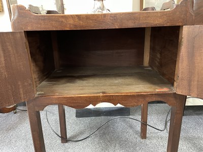 Lot 76 - A near pair of George III tray top pot cupboards