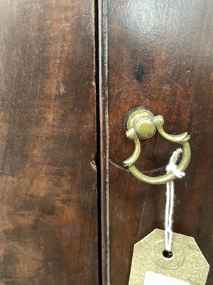 Lot 76 - A near pair of George III tray top pot cupboards