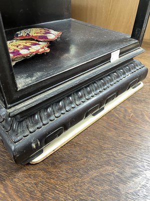 Lot 69 - A Chinese rosewood set of display shelves