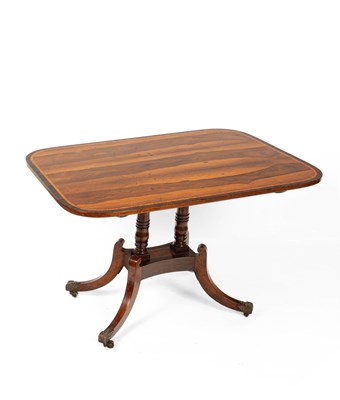 Lot 689 - A Regency Goncalo Alves tilt-top breakfast table