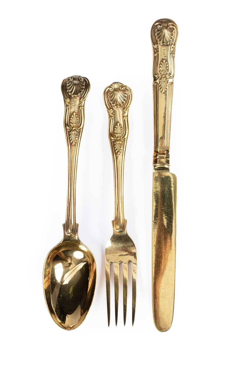 Lot 85 - A Victorian King's pattern silver gilt Christening set