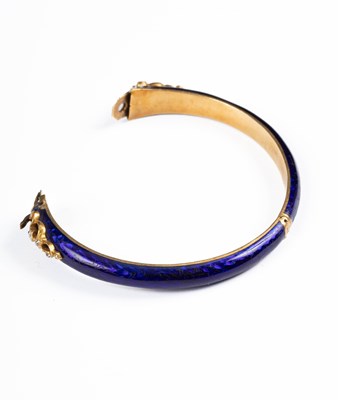 Lot 246 - A 19th Century yellow gold blue enamel and diamond part bangle