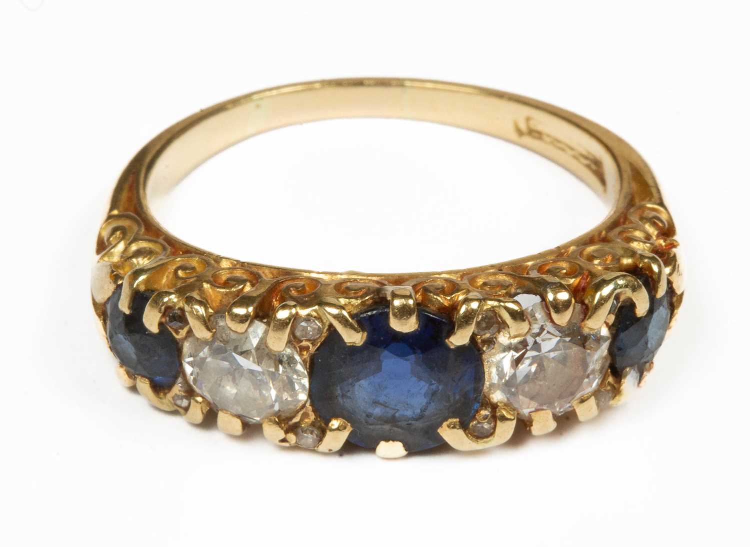 Lot 362 - A gold diamond and sapphire five-stone ring