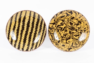 Lot 196 - Two marbled slipware dishes