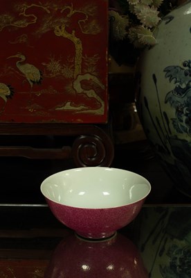 Lot 574 - A Chinese pink enamelled bowl