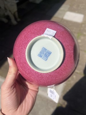 Lot 574 - A Chinese pink enamelled bowl