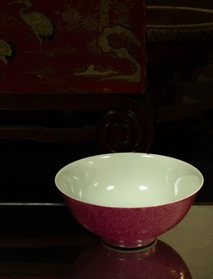 Lot 574 - A Chinese pink enamelled bowl