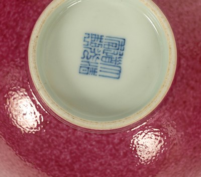 Lot 574 - A Chinese pink enamelled bowl