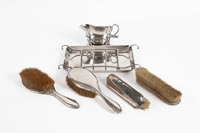 Lot 326 - A silver four-piece dressing set