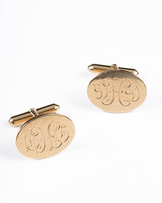 Lot 282 - A pair of yellow gold oval cufflinks