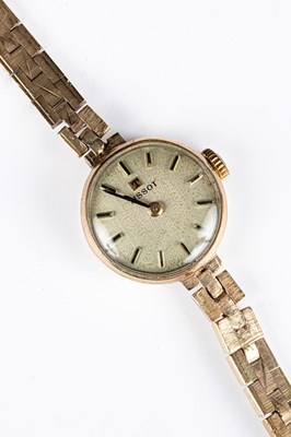 Lot 335 - A lady's 9ct yellow gold Tissot wristwatch