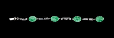 Lot 292 - A 9ct white gold and jade bracelet