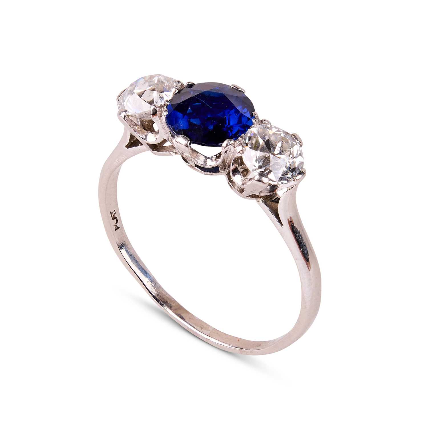 Lot 298 - A sapphire and diamond three-stone ring