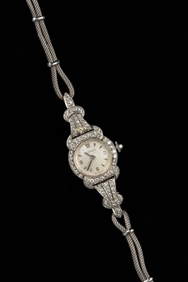 Lot 338 - A lady’s 9ct white gold and diamond Movado cocktail watch