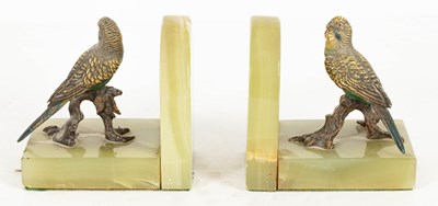 Lot 785 - A pair of cold painted bronze bookends