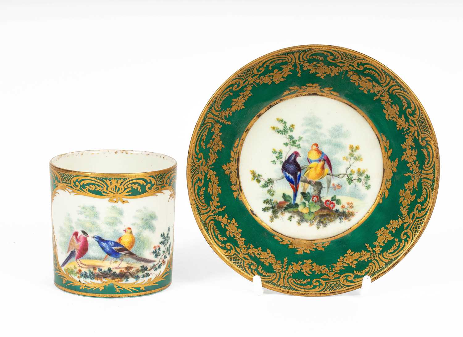 Lot 747 - A Sèvres green ground cup and saucer