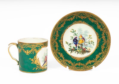 Lot 505 - A Sèvres green ground cup and saucer