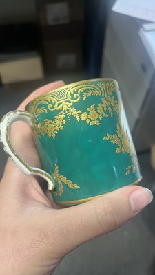 Lot 747 - A Sèvres green ground cup and saucer