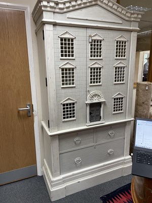 Lot 563 - An Andrew Martin doll's house cabinet