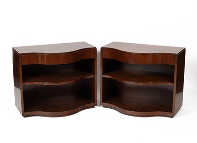 Lot 571 - A pair of Councill serpentine fronted bedside tables