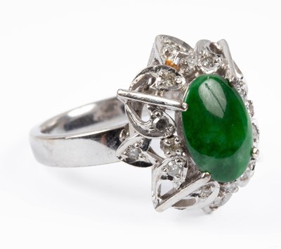 Lot 315 - A white gold, jade and diamond dress ring