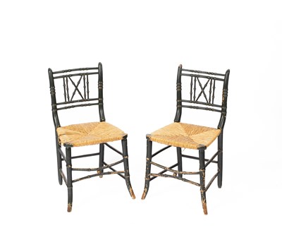 Lot 535 - A pair of green painted faux bamboo chairs