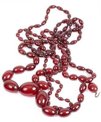 Lot 388 - Two cherry amber necklaces