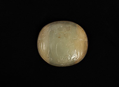 Lot 593 - A carved oval jade plaque