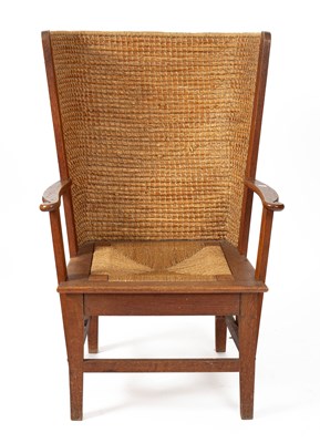 Lot 480 - An Orkney Highland oak and woven rush back arm chair