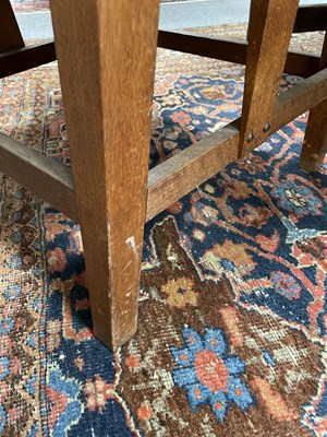 Lot 480 - An Orkney Highland oak and woven rush back arm chair