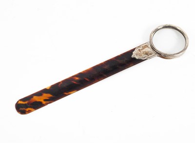 Lot 419 - A silver mounted tortoiseshell paper knife/magnifying glass