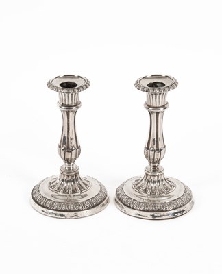 Lot 328 - A pair of George III silver candlesticks