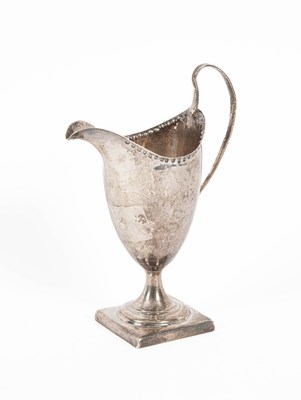 Lot 401 - A George III silver tea jug