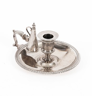 Lot 329 - A George III silver chamberstick