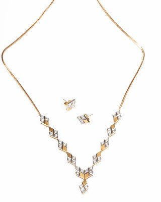 Lot 202 - An Italian 18ct yellow gold and diamond necklace and the matching earrings