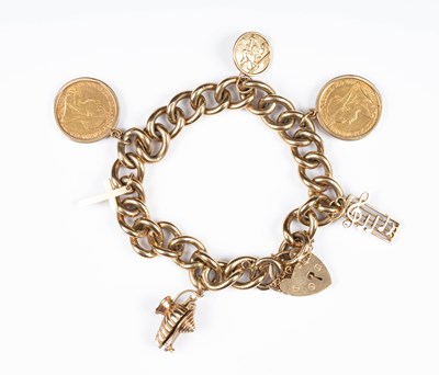 Lot 208 - A 9ct yellow gold charm bracelet