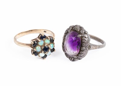 Lot 360 - A 9ct gold opal and sapphire ring