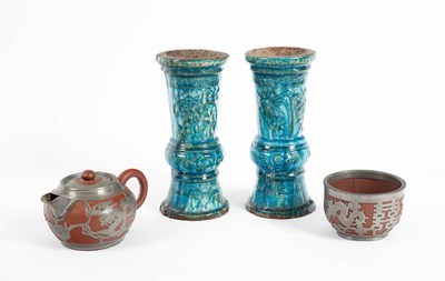 Lot 556 - A pair of Chinese turquoise glazed Gu vases