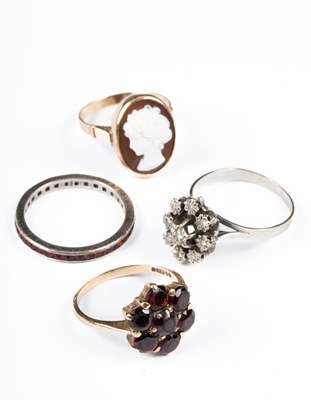 Lot 214 - Four gold and silver dress rings