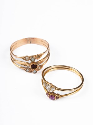 Lot 215 - Two gold coloured stacking rings